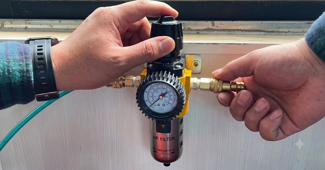 Hands adjusting a yellow Lematec air pressure regulator and filter unit mounted on a wall for pneumatic systems.