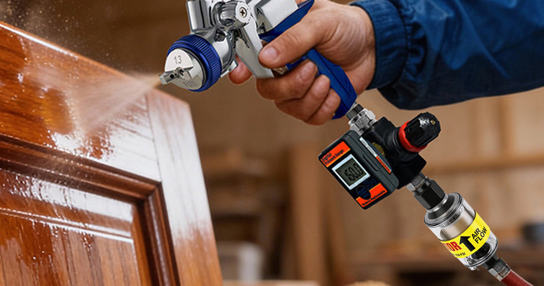 Le Lematec digital air regulator and moisture filter on a spray gun for professional woodworking and furniture finishing