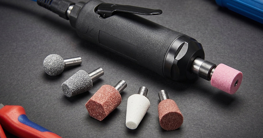 Lematec pneumatic die grinder tool with various abrasive grinding bits and accessories on a dark workspace surface.