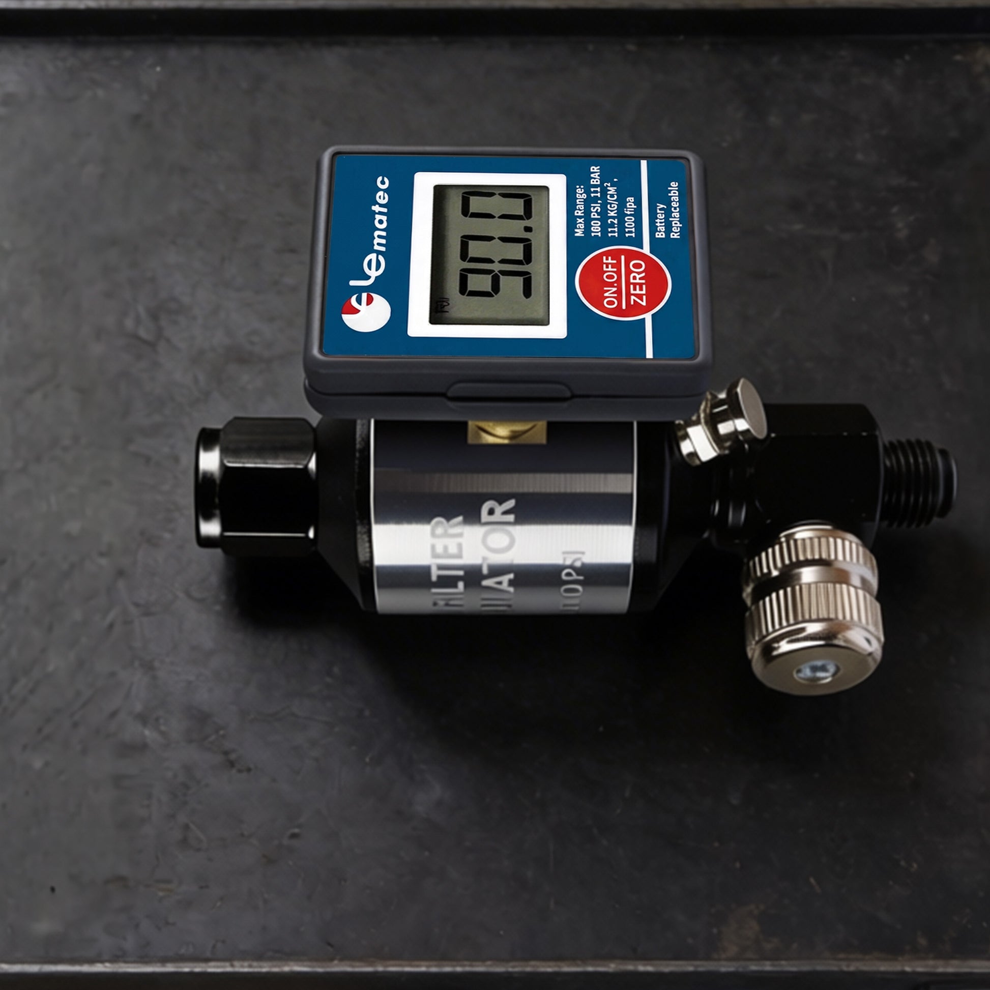 AI303-R2 air filter regulator on a steel bench showing the digital head, aluminum bowl, chrome drain and NPT thread