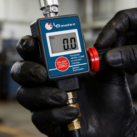 Technician in work gloves holding the DAR03B digital air regulator with brass inlet fitting, LCD at 0.0 PSI
