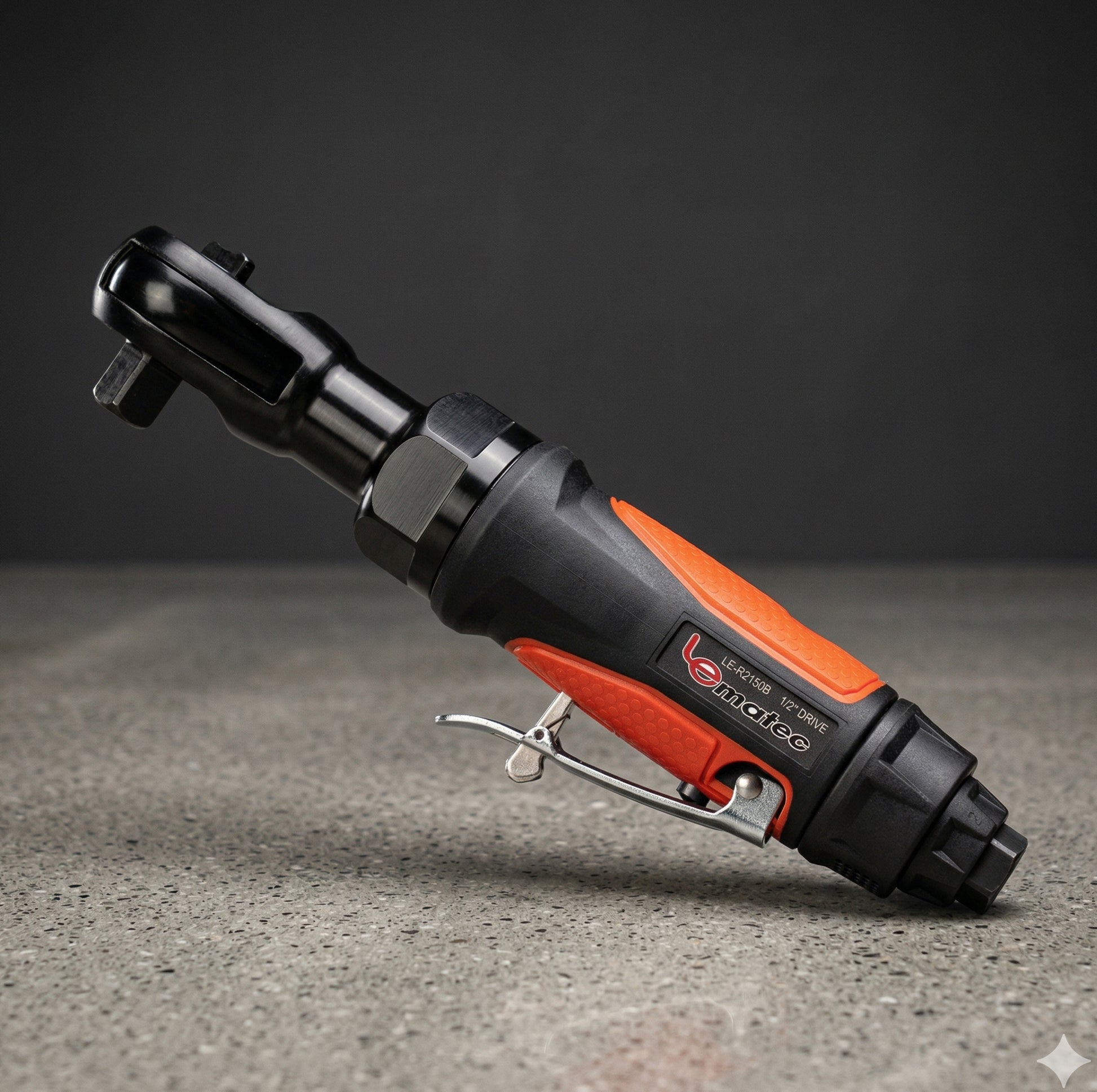 LE-R2150B 1/2 inch pneumatic ratchet wrench with ergonomic orange grip and throttle lever on concrete surface